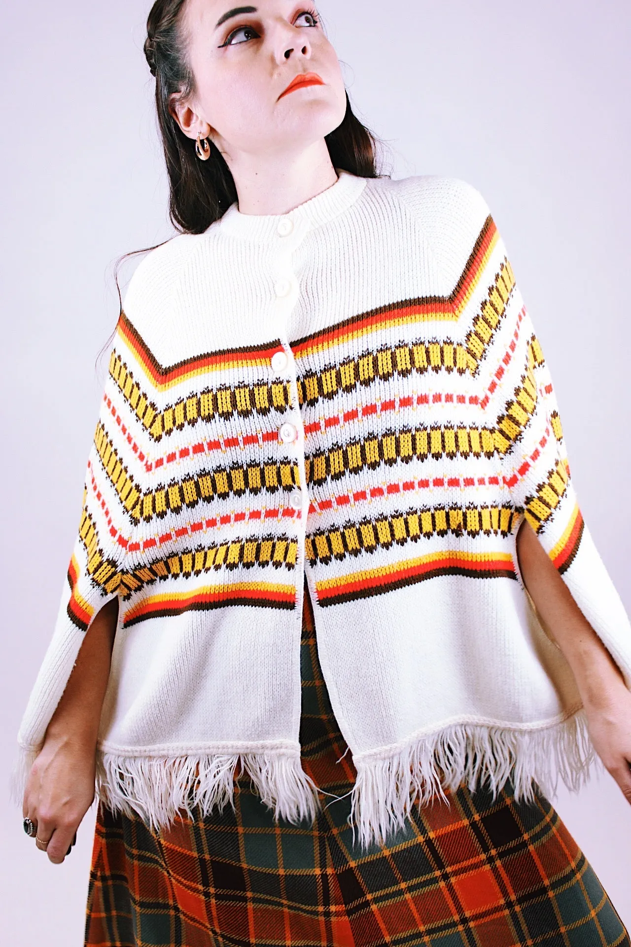 Knitted Fringed Poncho