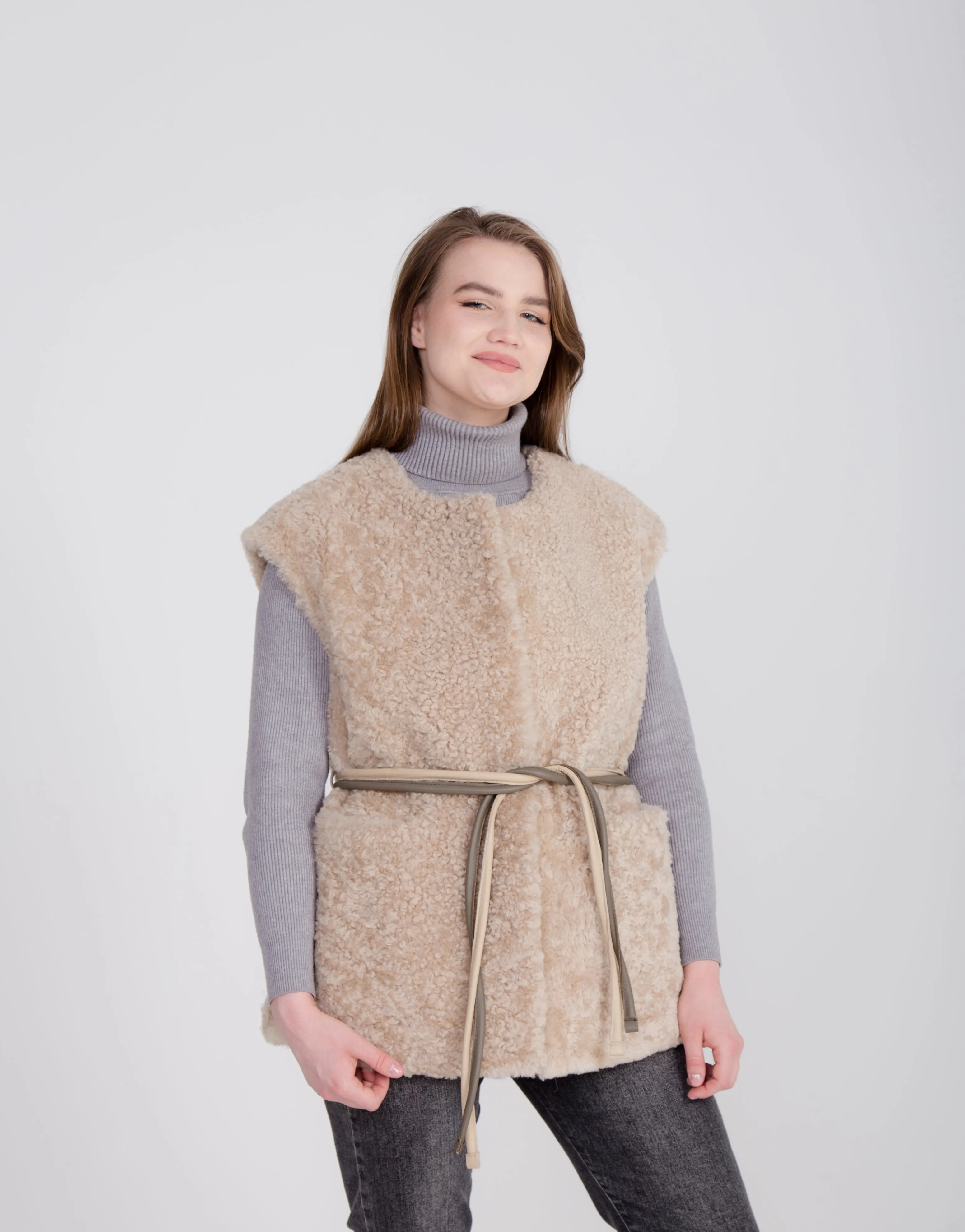 Long Beige Womens Shearling Vest with Boucle Sheepskin and Two Colored Leather Belt